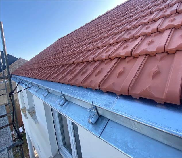 Remplacement gouttière zinc BM Couverture Rénovation